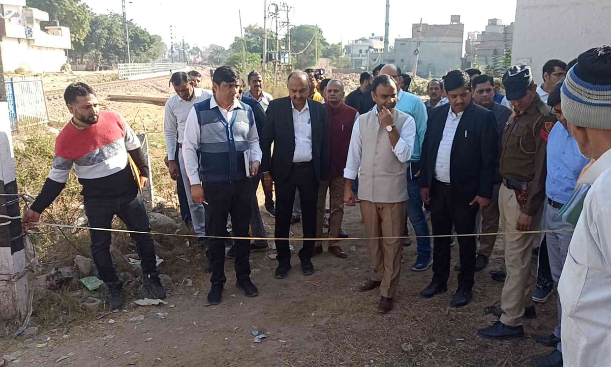 15-15 feet wide road will be built on both sides of the elevated railway track