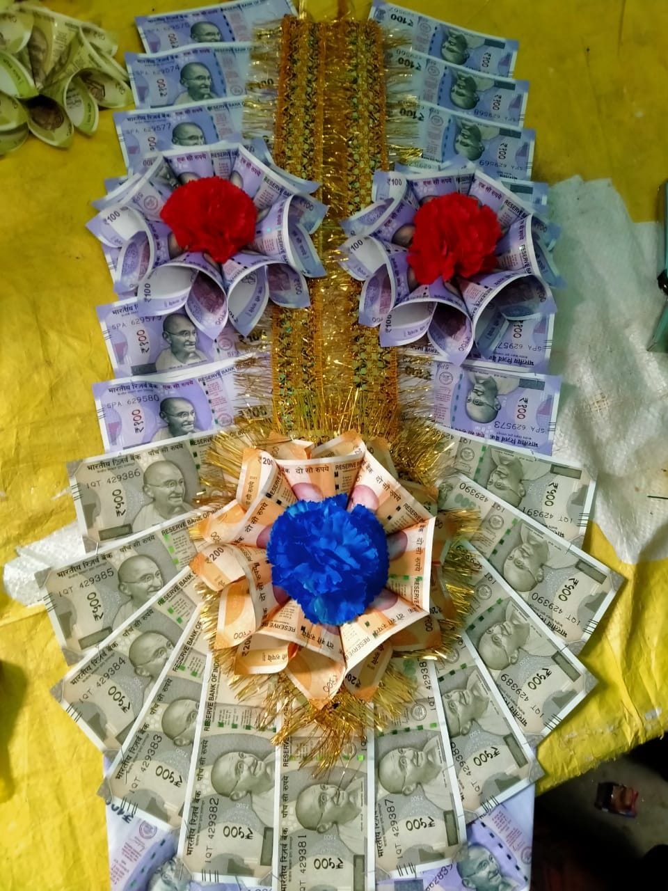 A garland of notes made in the city.