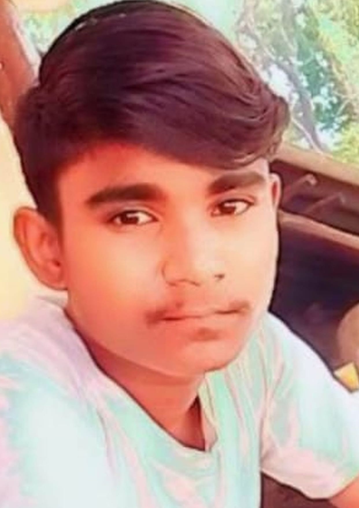 A teenager sitting on the railway track listening to music with headphones in his ears was hit by a train