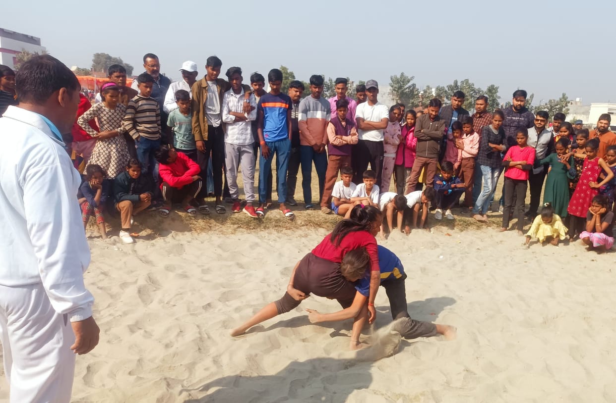 Chaos prevailed...children wrestled in the sand