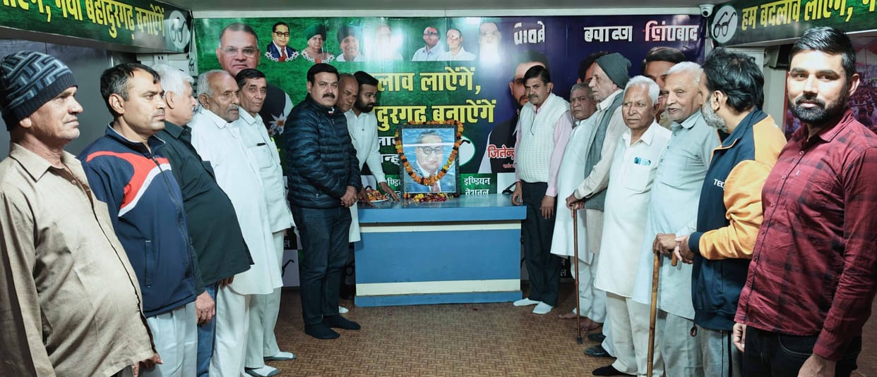 Resolved to follow the path shown by Ambedkar