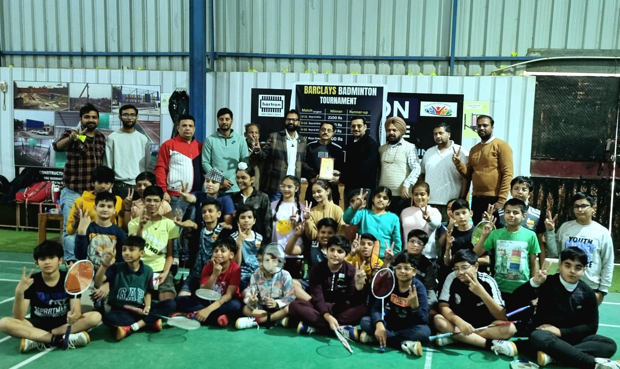 Young children showing their strength in badminton tournament