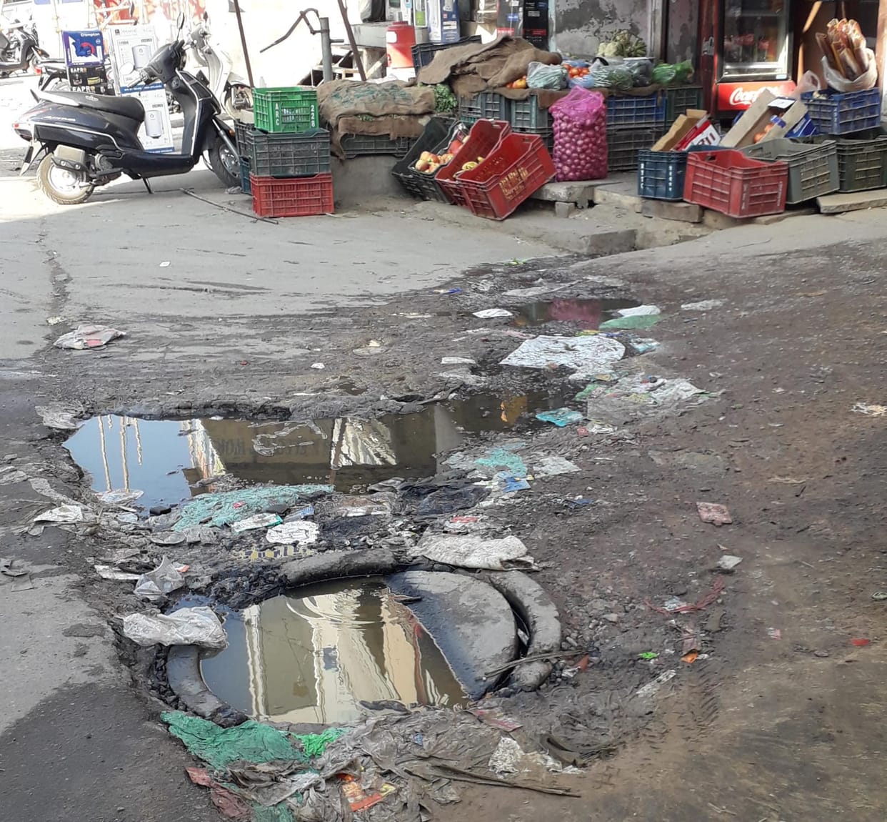 Dirty water coming out of sewer manhole, problem