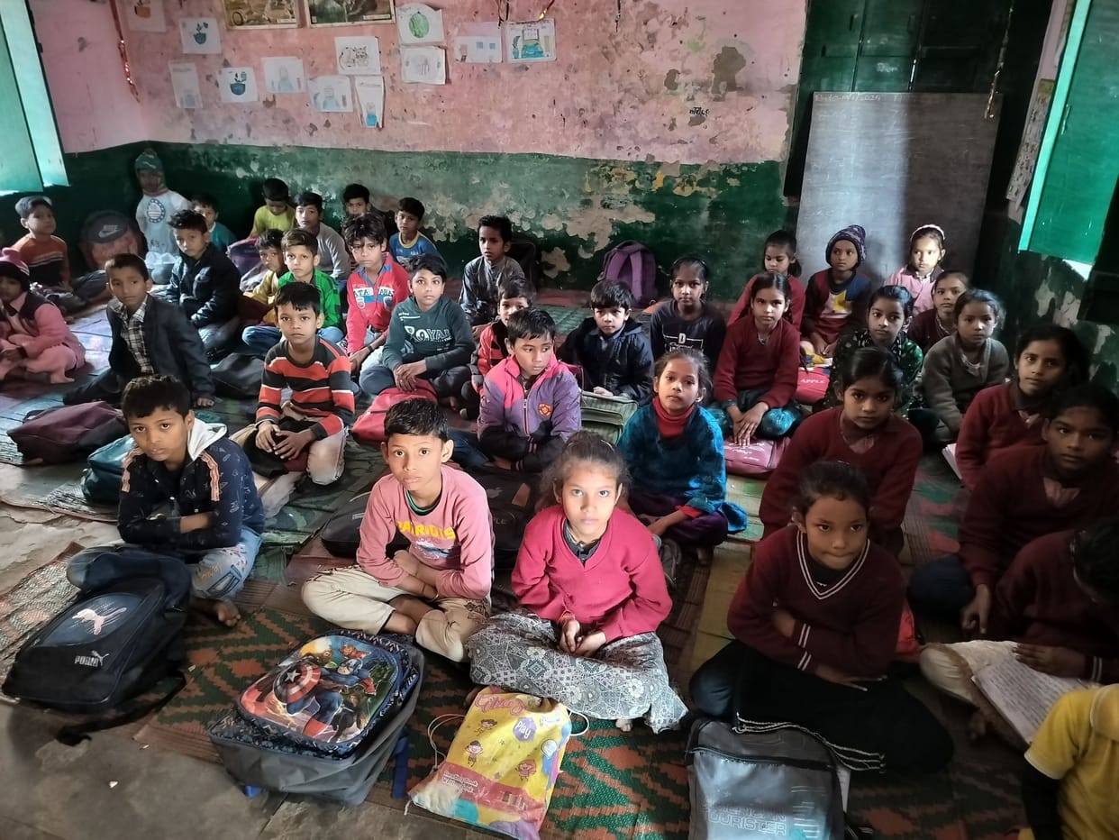 Furniture not delivered, children sitting on floor in cold