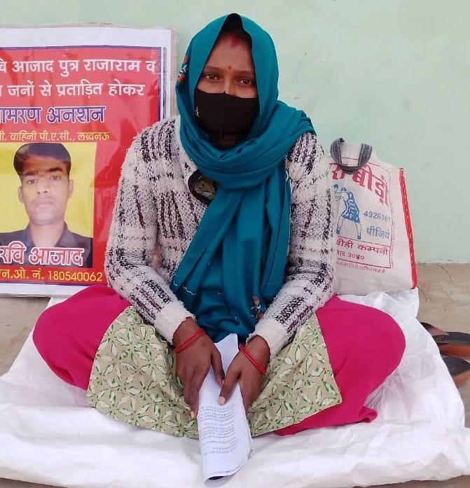 Woman fed up with harassment by PAC employee husband sits on strike