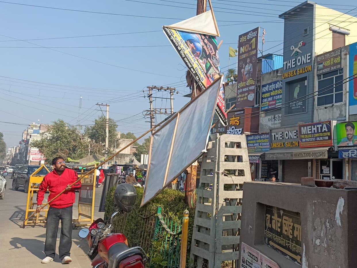 Municipal council employees removed the flakes hanging on street lights