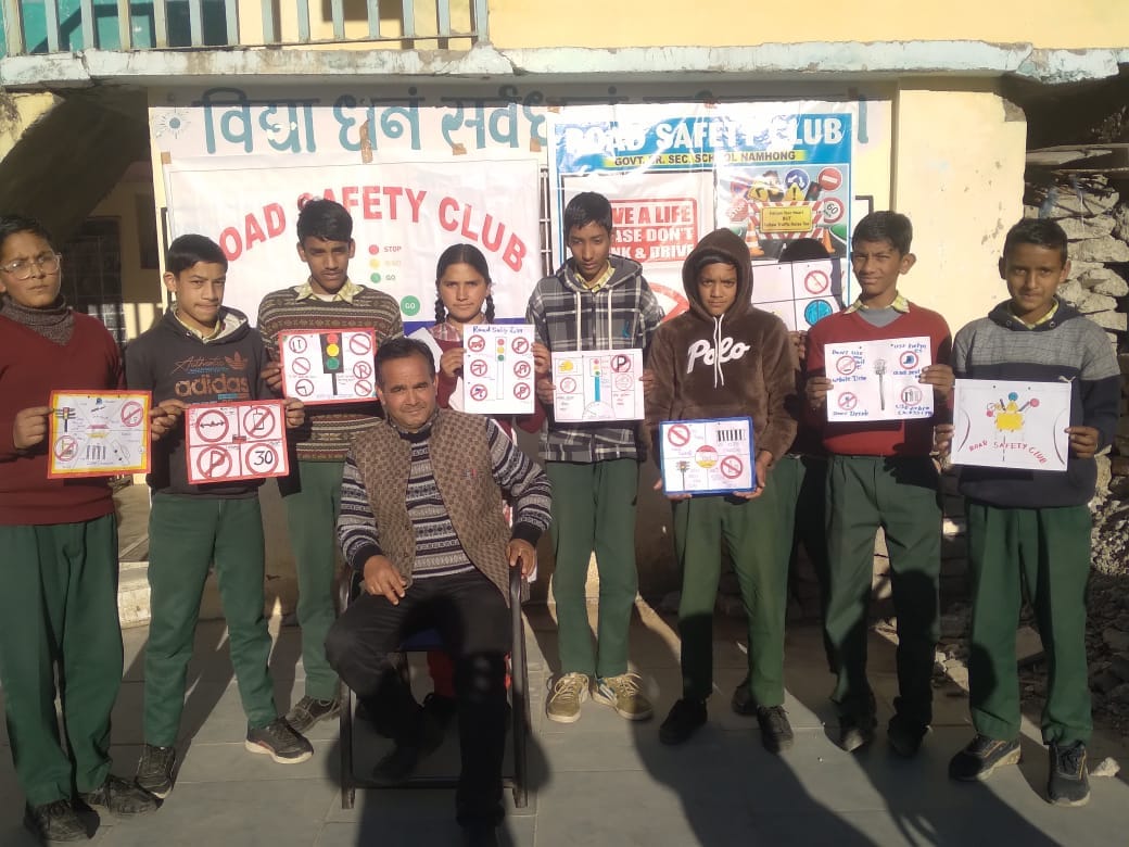 Road safety message given through painting, rangoli and speech