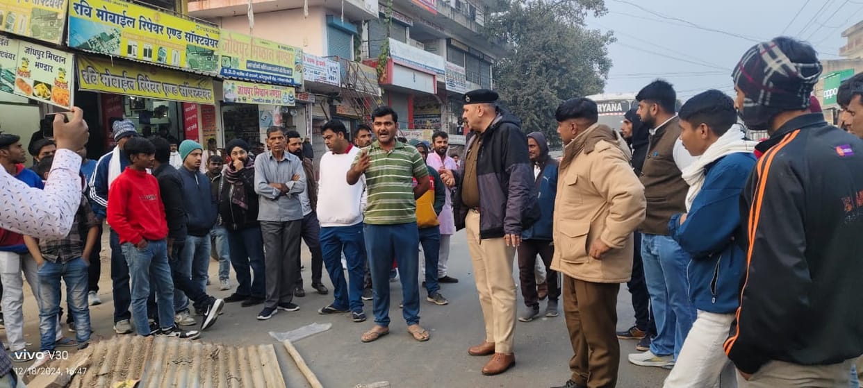 Shopkeeper demonstrated by keeping goods in the middle of the road