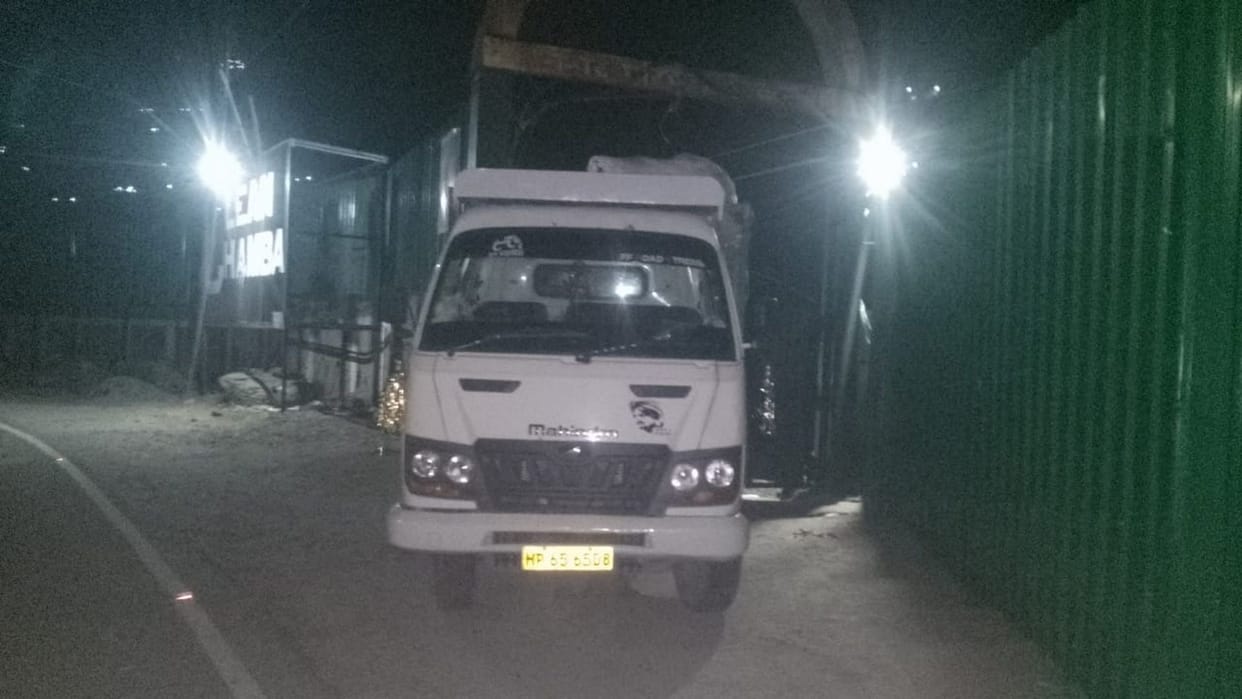 Mountain of garbage in dumping site, angry people stopped vehicles