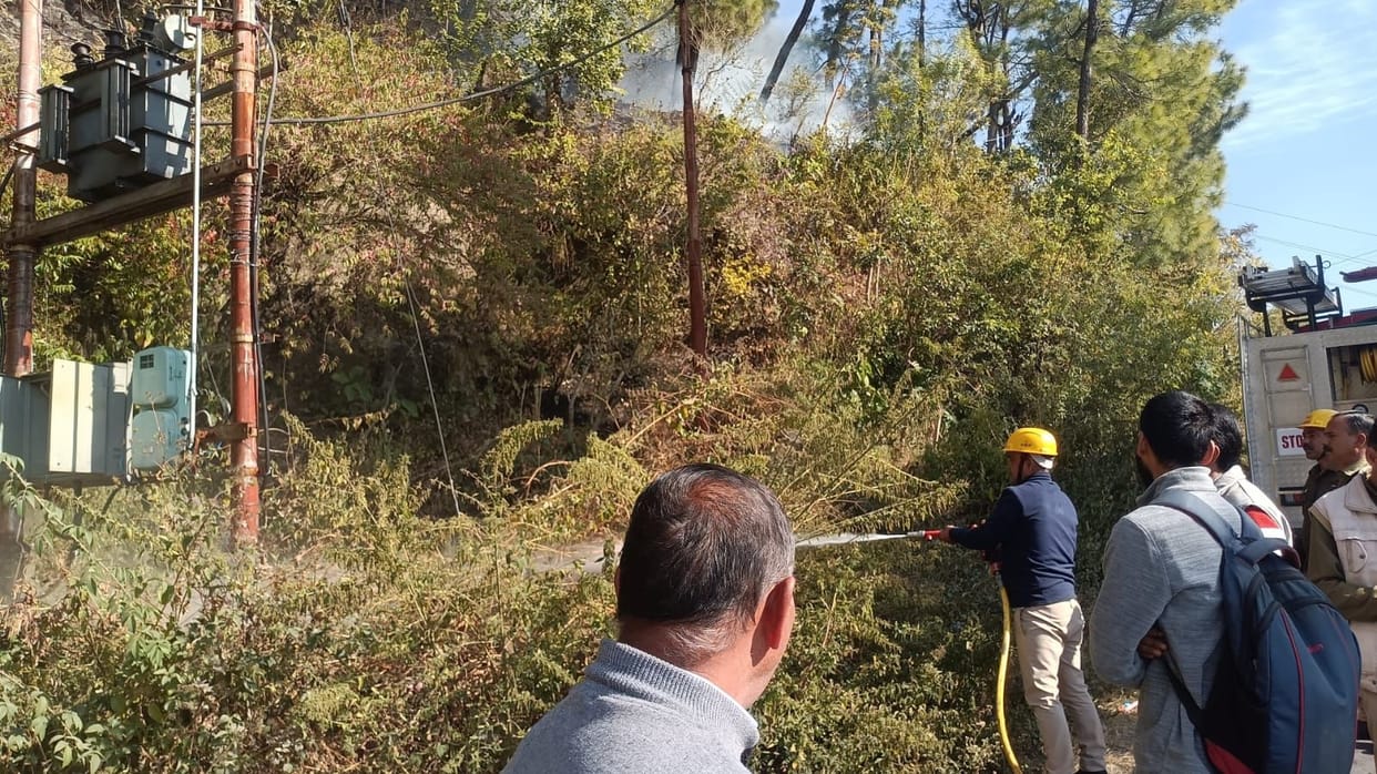Electrical transformer caught in forest fire
