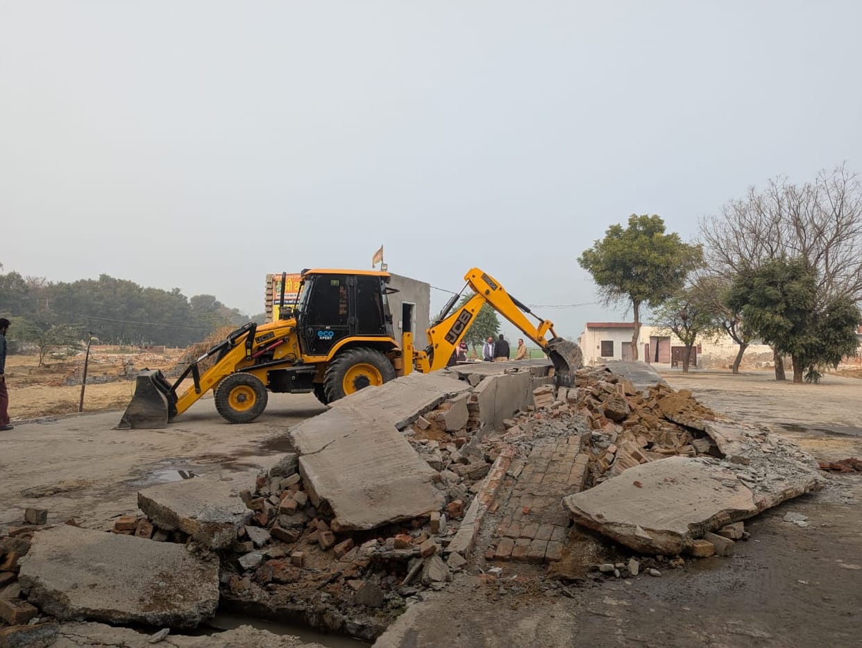 The district town planner's team demolished illegal constructions