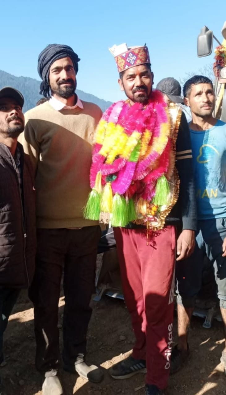 Road reaches village, JCB machine operator welcomed with flowers