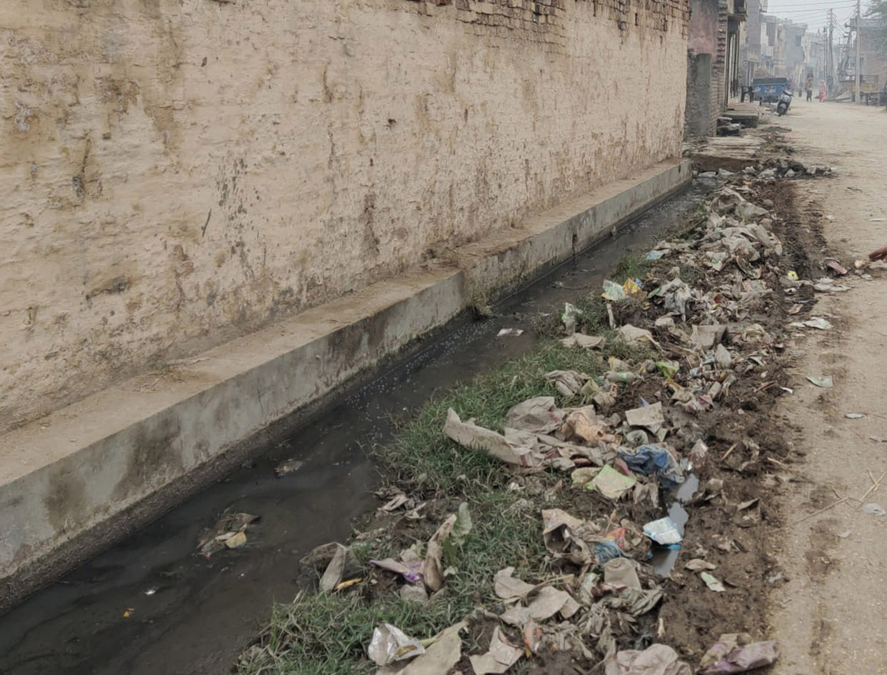 There are heaps of garbage everywhere in Jalalpur village