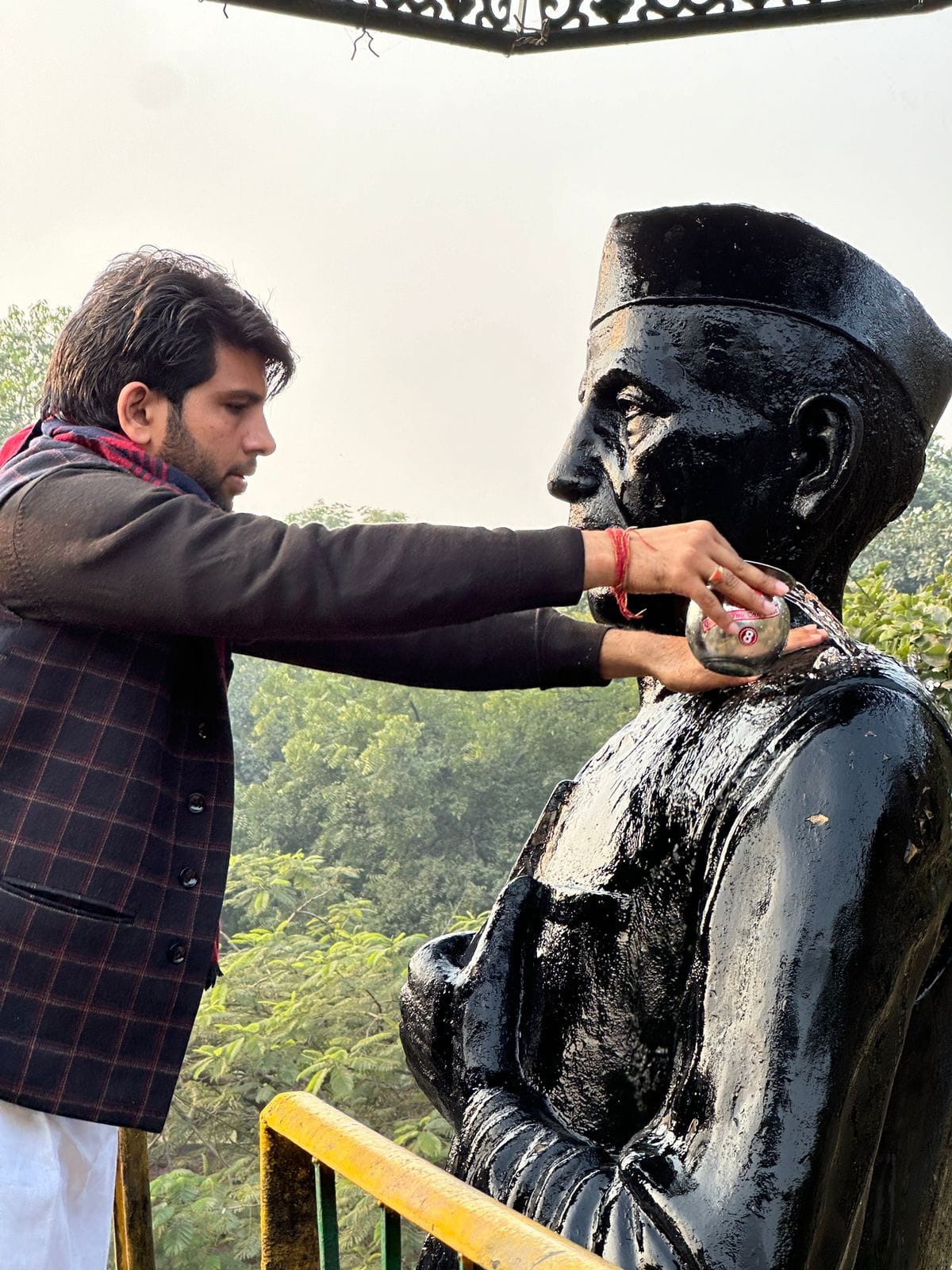 Chaudhary Charan Singh's statue bathed with milk