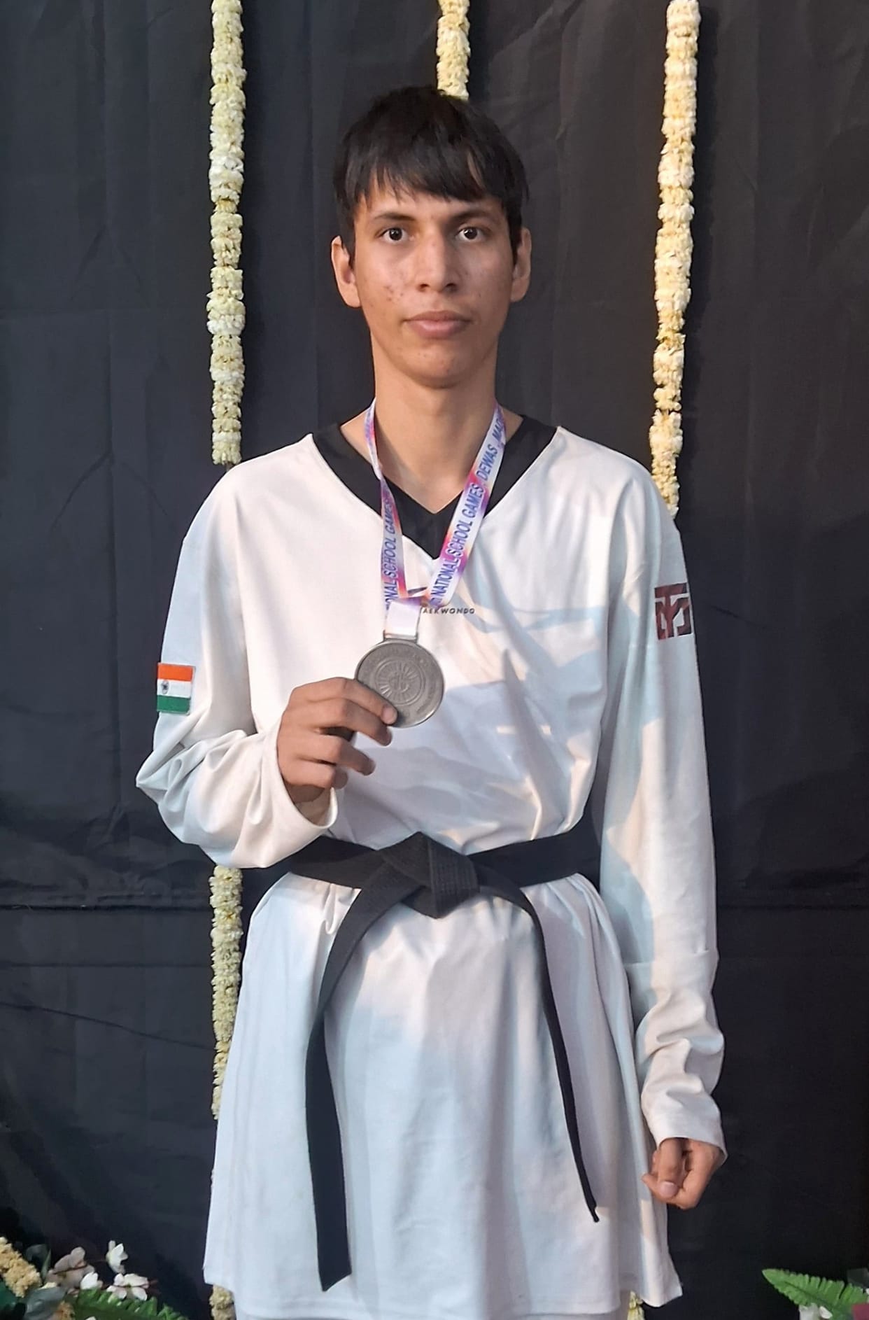 Hardik won silver medal in Taekwondo event