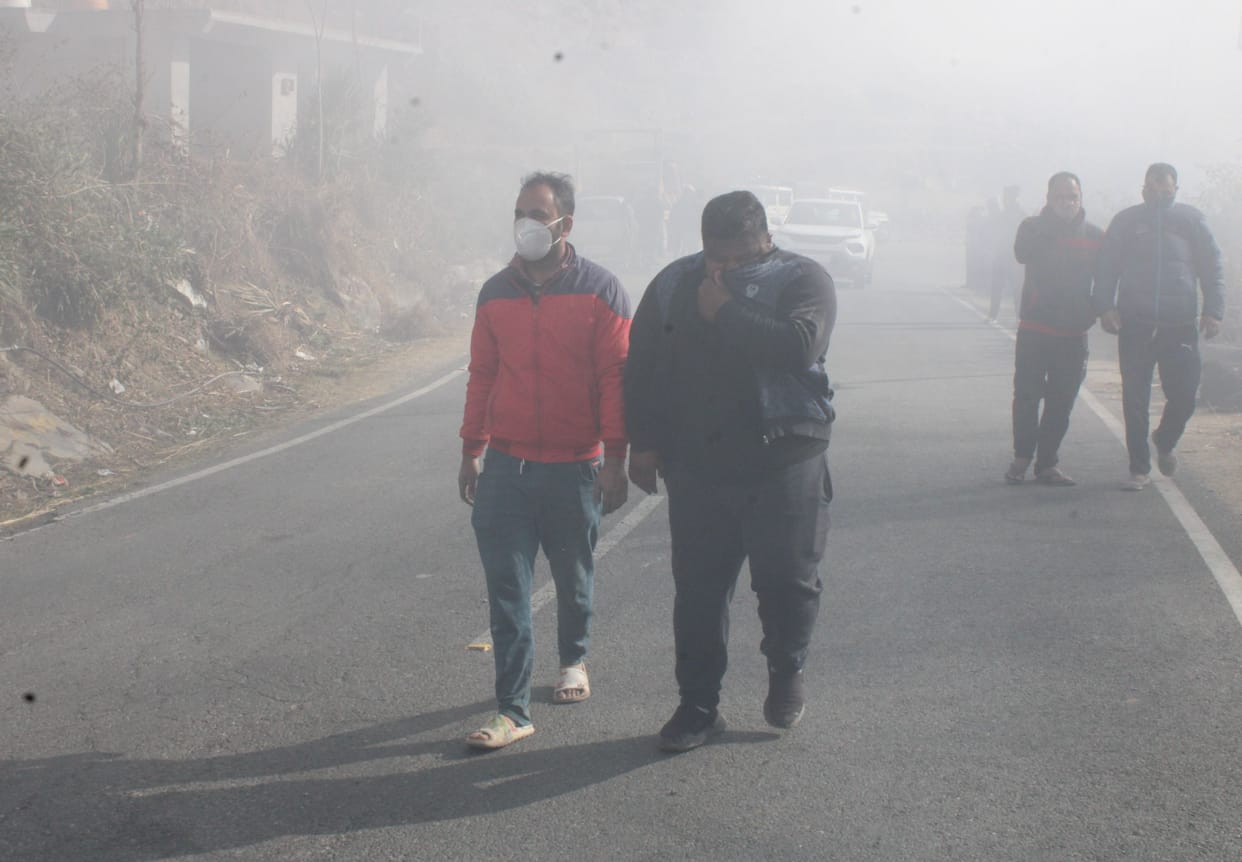 The mountain of garbage kept burning the whole day...breathing kept suffocating.