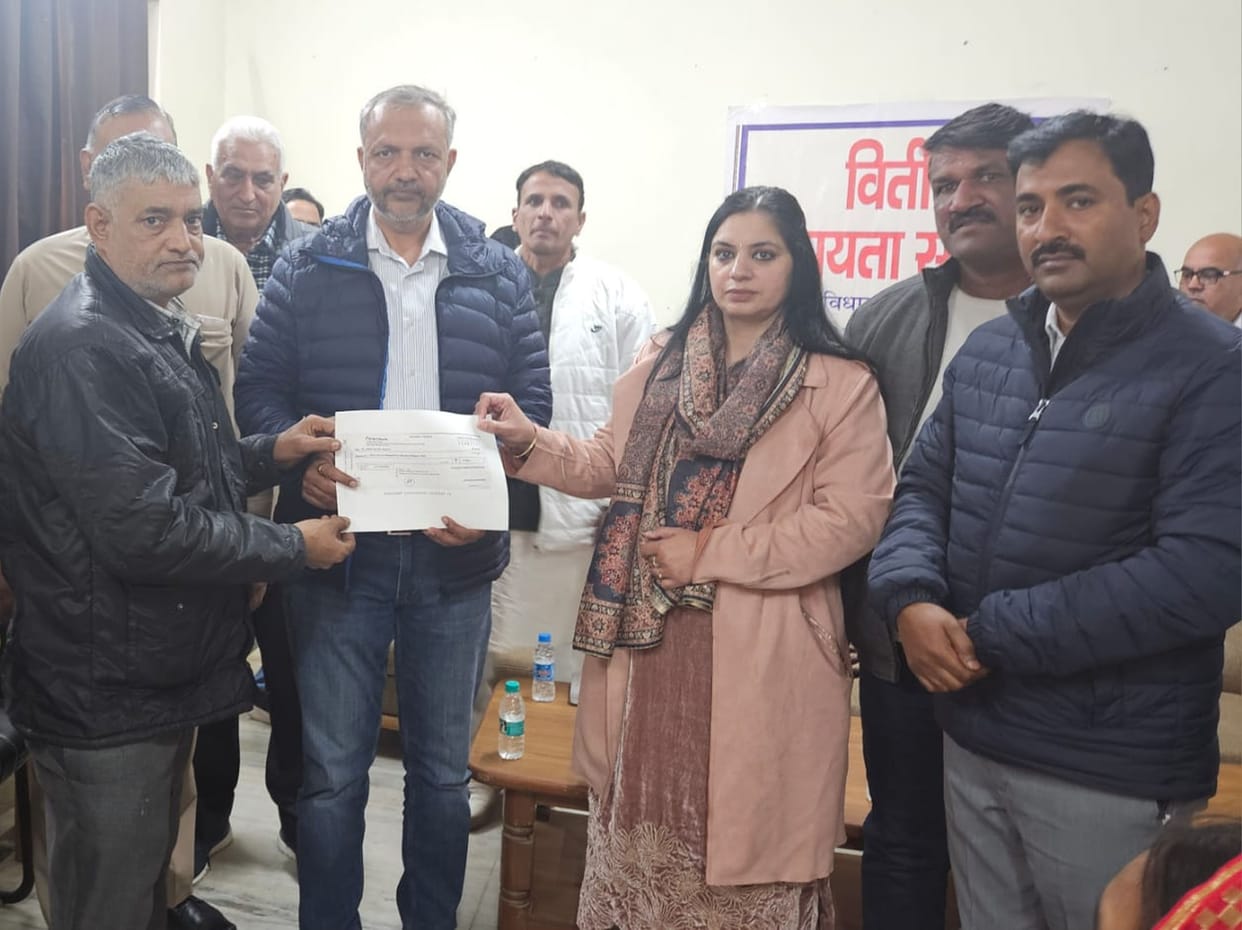 mla givent chek to accident victim farmers