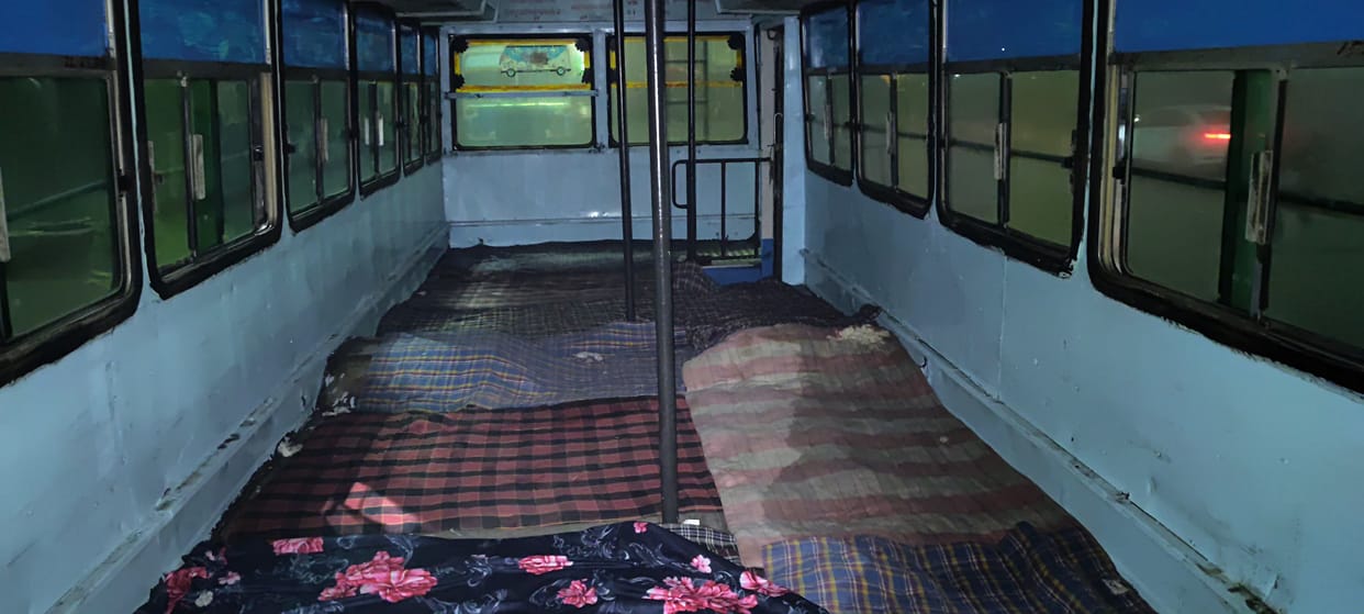 Two buses converted into night shelters in Ambala; wet mattresses, open windows and no blankets