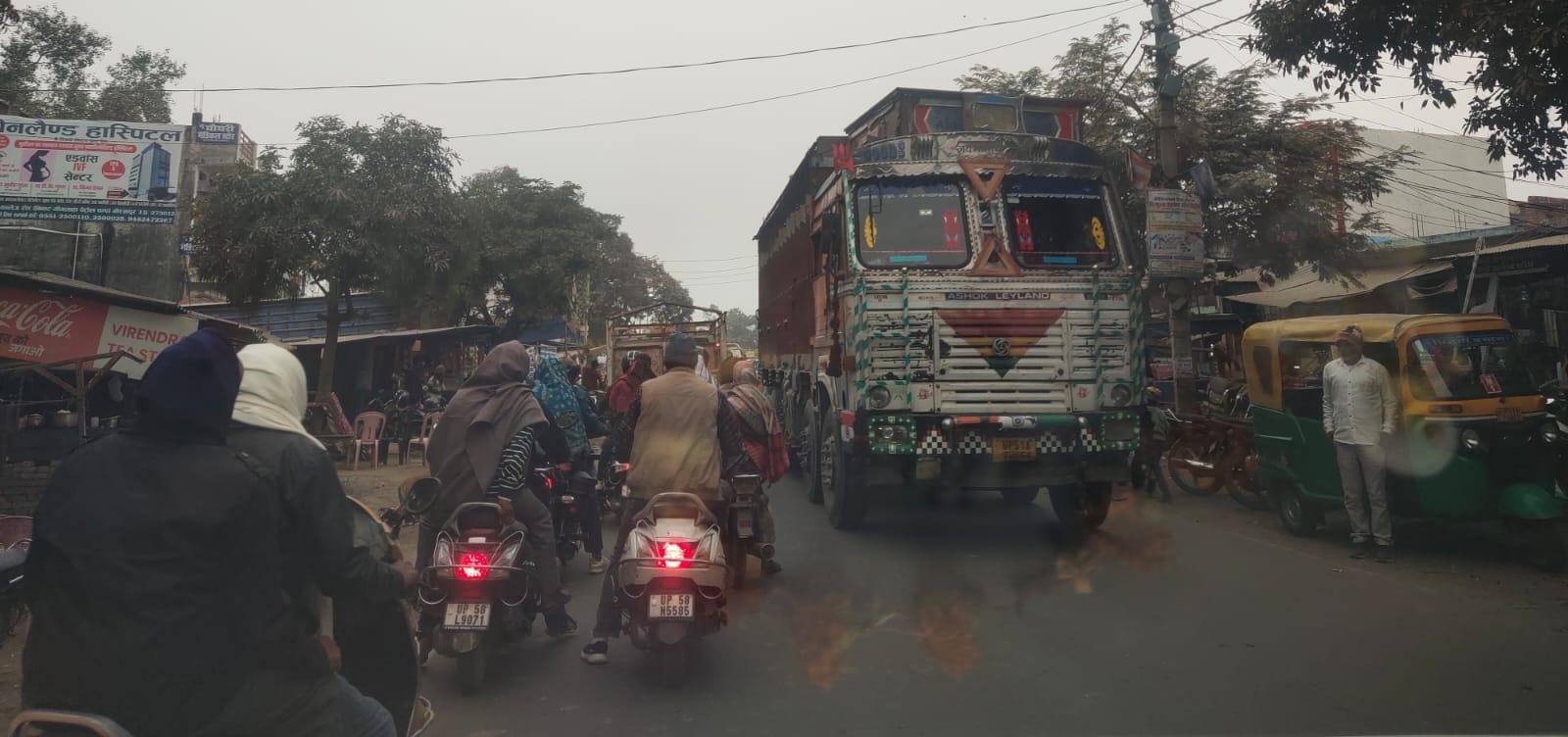 Pedestrians facing encroachment and traffic jam at intersections