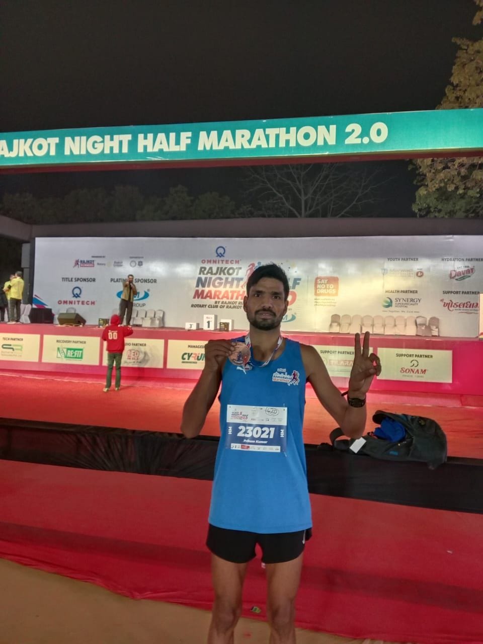 Pritam won gold in the night half marathon held in Rajkot.