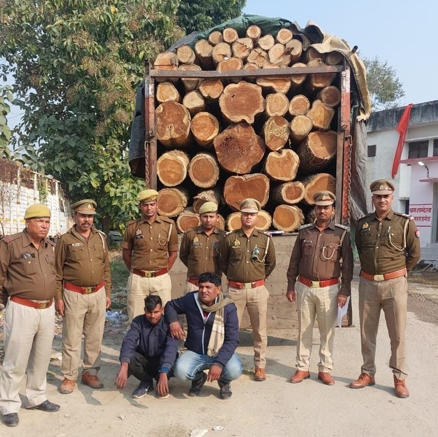 Two smugglers arrested with a truck carrying teak wood