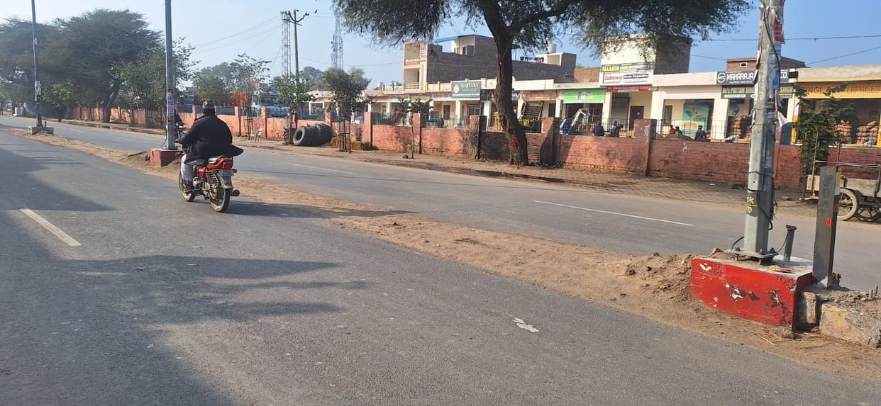 Divider has been uprooted and left on the main road for one and a half years, officials are waiting for vigilance investigation report of street light