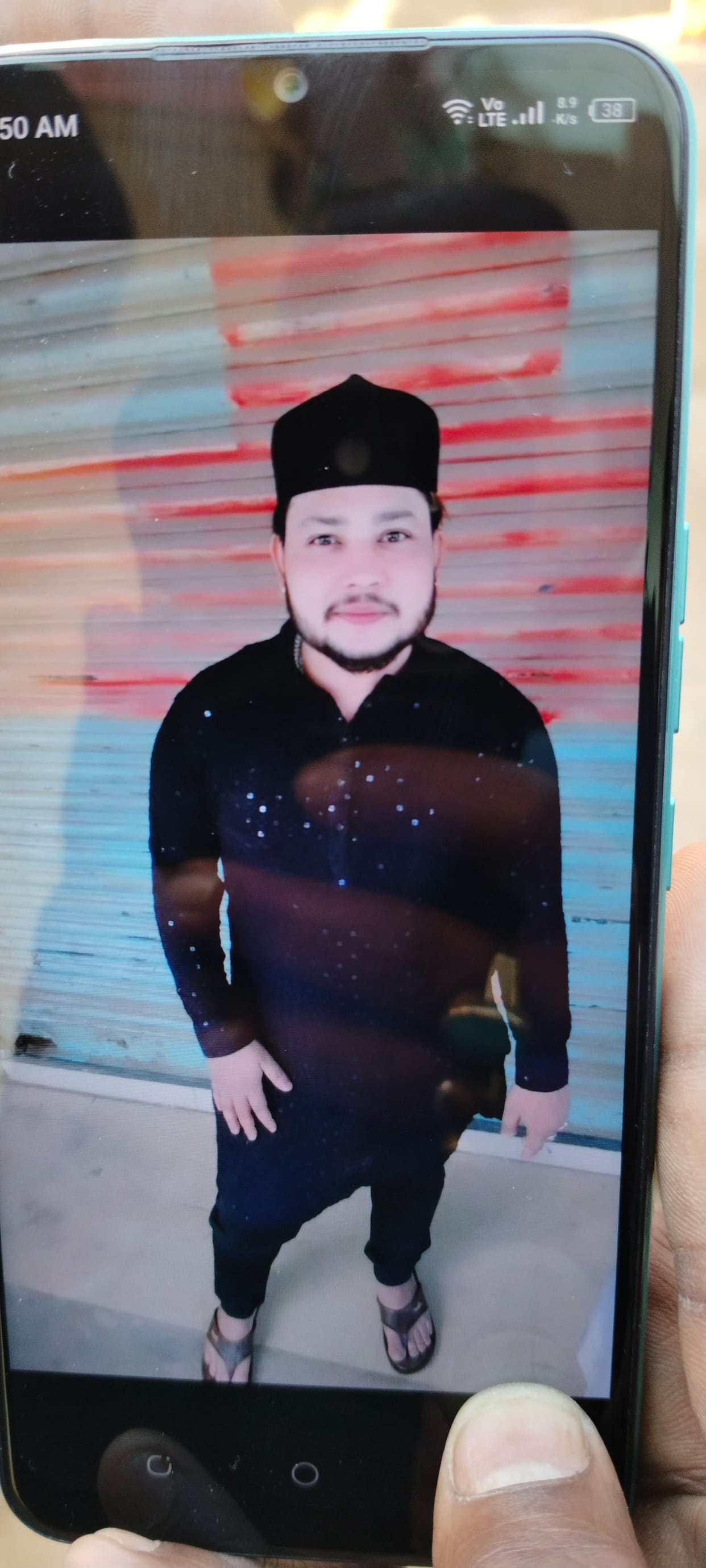 A young man was shot dead after entering his house