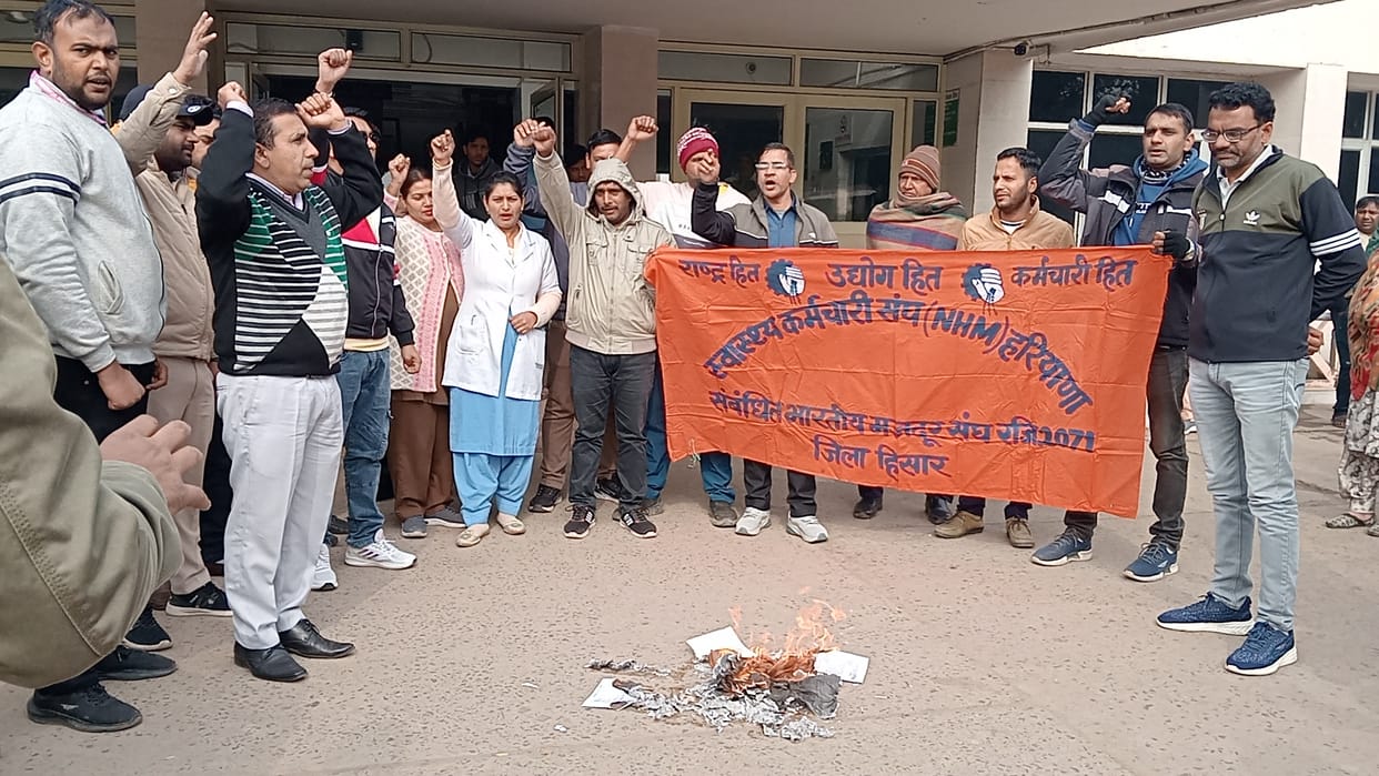 NHM employees burn copies of orders in protest against repeal of service rules