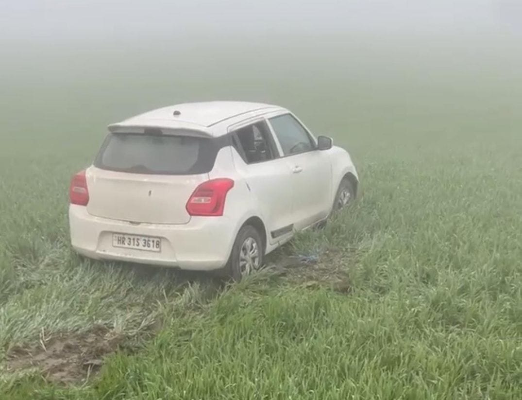 Car landed in field due to fog
