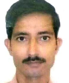 Car collides with tractor, teacher dies