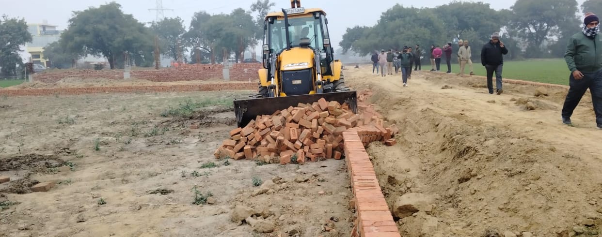 Authority's bulldozer runs on two unauthorized colonies