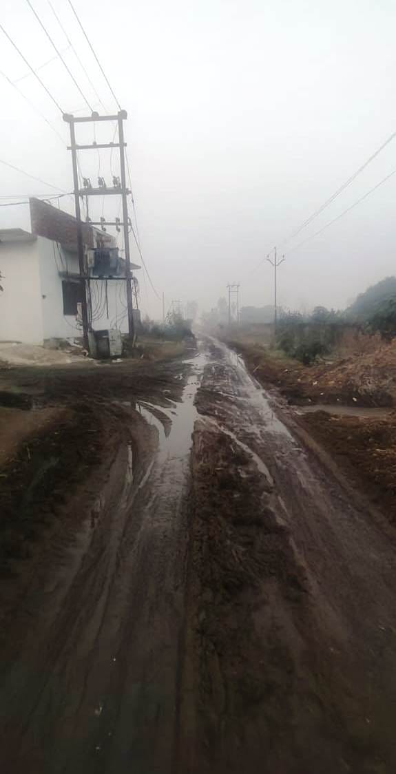 Waterlogging on Jhitkari Road due to lack of cleaning of drain