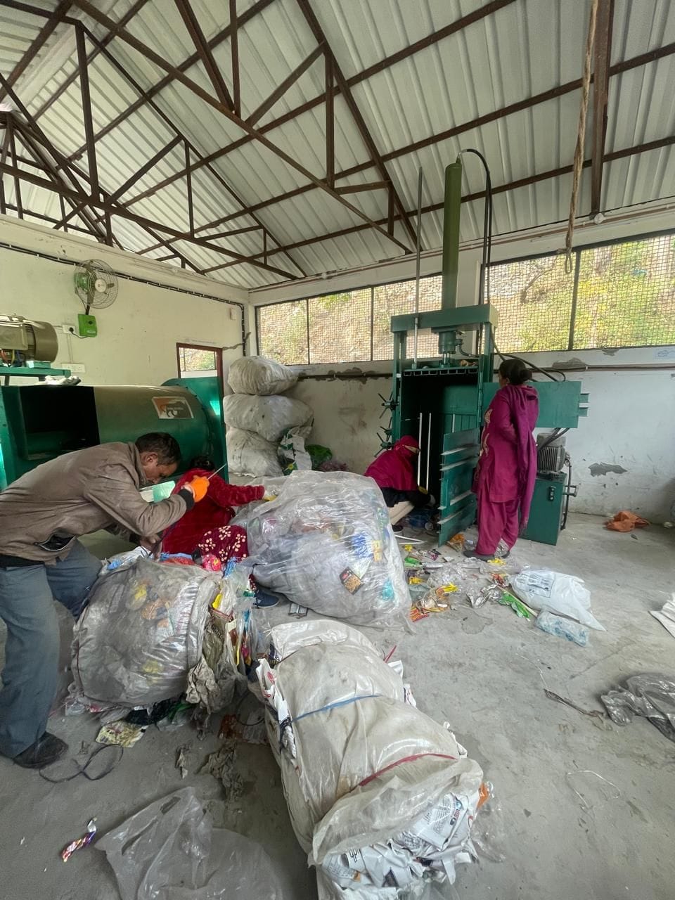 Packets of plastic waste being made in Maredi
