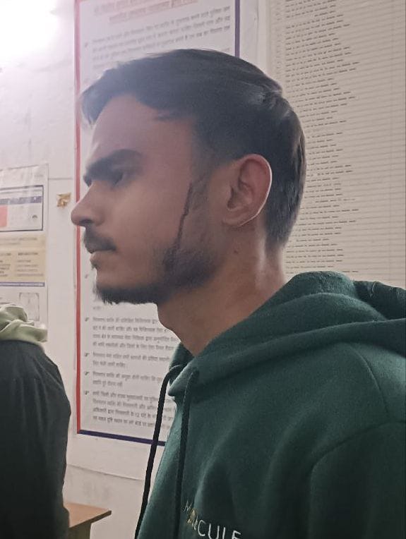Accused of attacking a young man with a knife