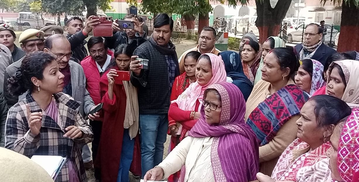 Women got angry and tried to surround the minister in charge.