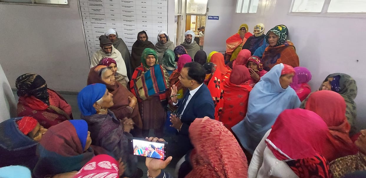 Workers protested demanding transfer of Gram Panchayat Secretary and Employment Assistant.