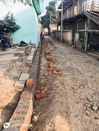 Demand to construct the road by filling it with soil and having a drain.