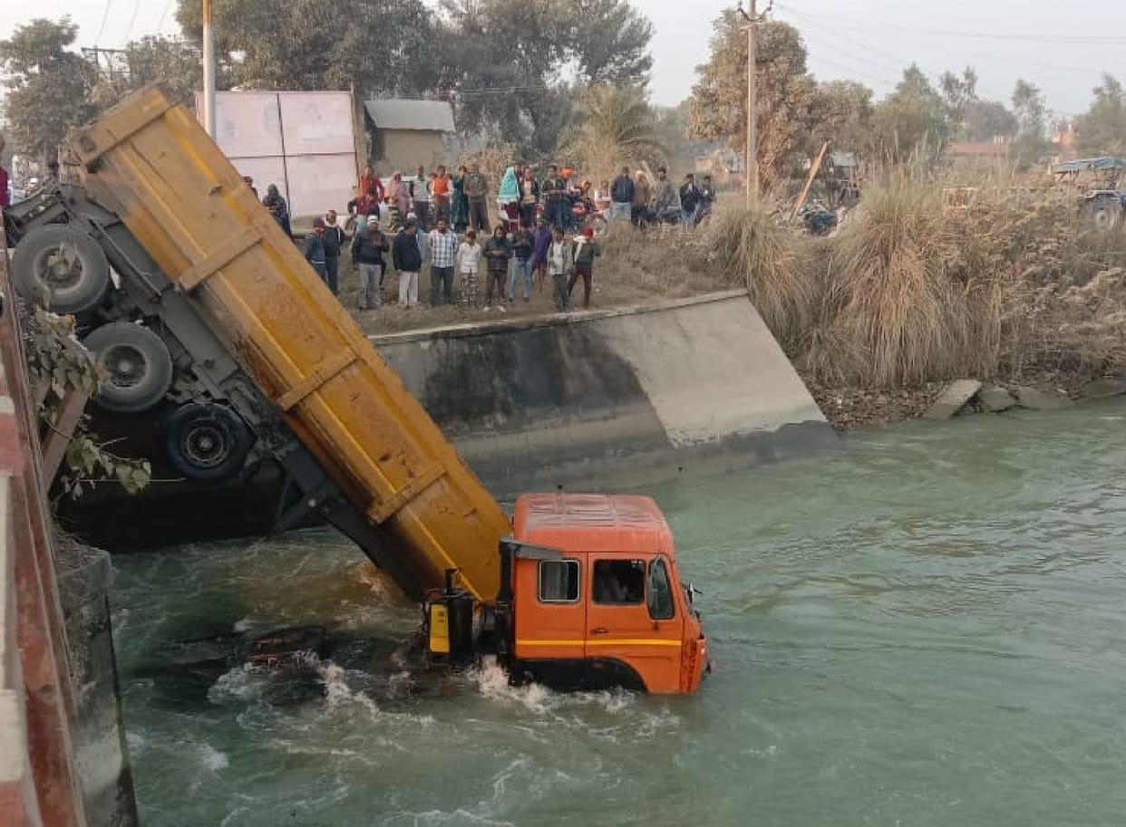 The trolley broke the railing and fell into the canal