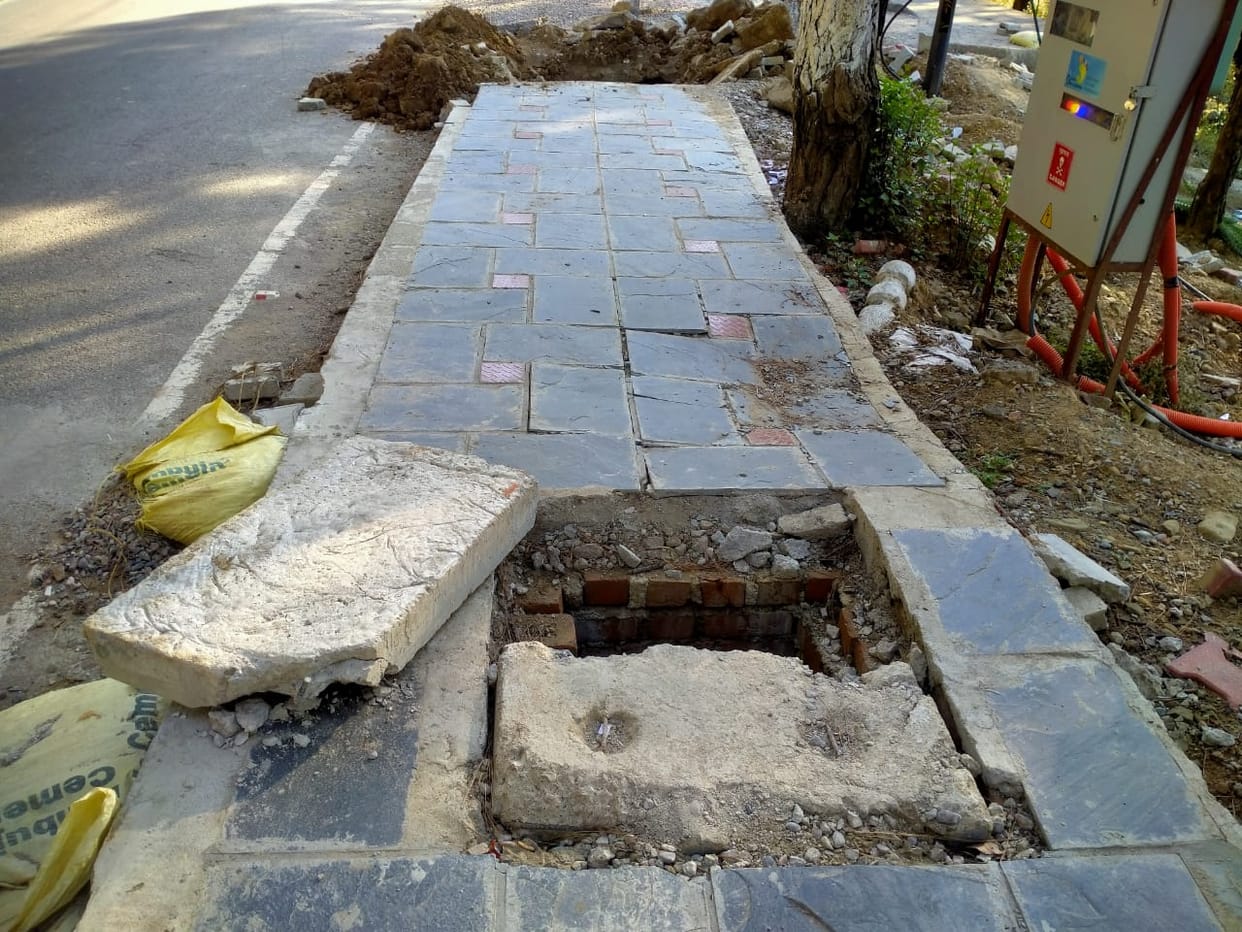 Footpaths are being demolished repeatedly in the name of laying underground cables in Smart City Dharamshala.
