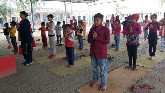 Surya Namaskar practice conducted in village Pegan