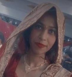 The body of an eight-month pregnant woman was found hanging from a noose