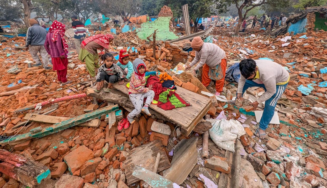 After slum demolition, night passed under open sky, three fell ill