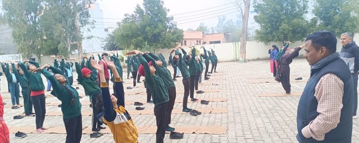 Surya Namaskar was done to the students in Bhaparoda school