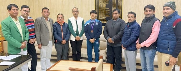 Khushi third in university women's wrestling, honored