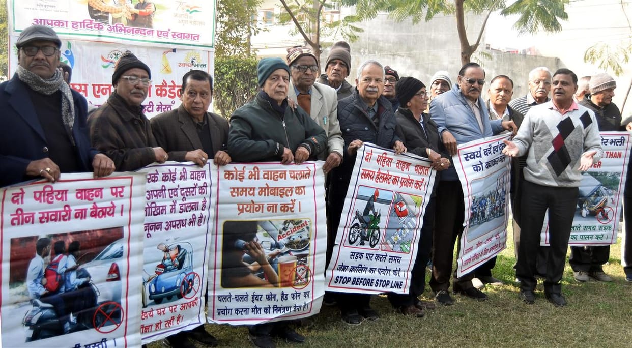 Create awareness about road safety and distribute helmets