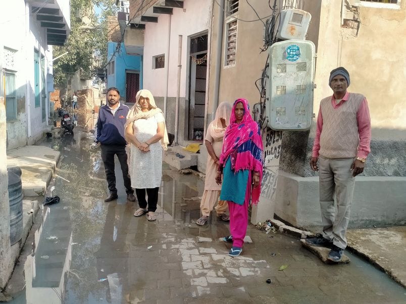 Sewer overflow, contaminated water filled on the road