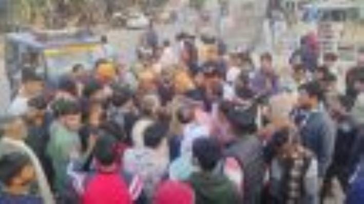 Blocked Sankisa intersection by placing student's body on tractor