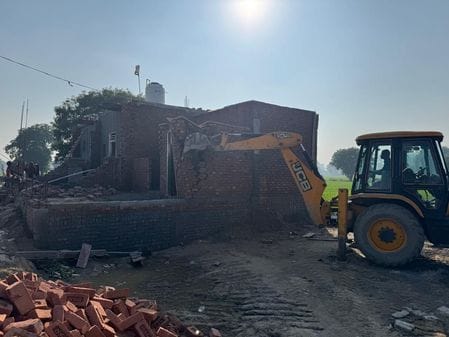 Bulldozers were run on two colonies built on eight acres