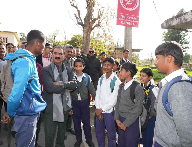 Stopped the convoy and asked the children... whether English medium was started in the school or not