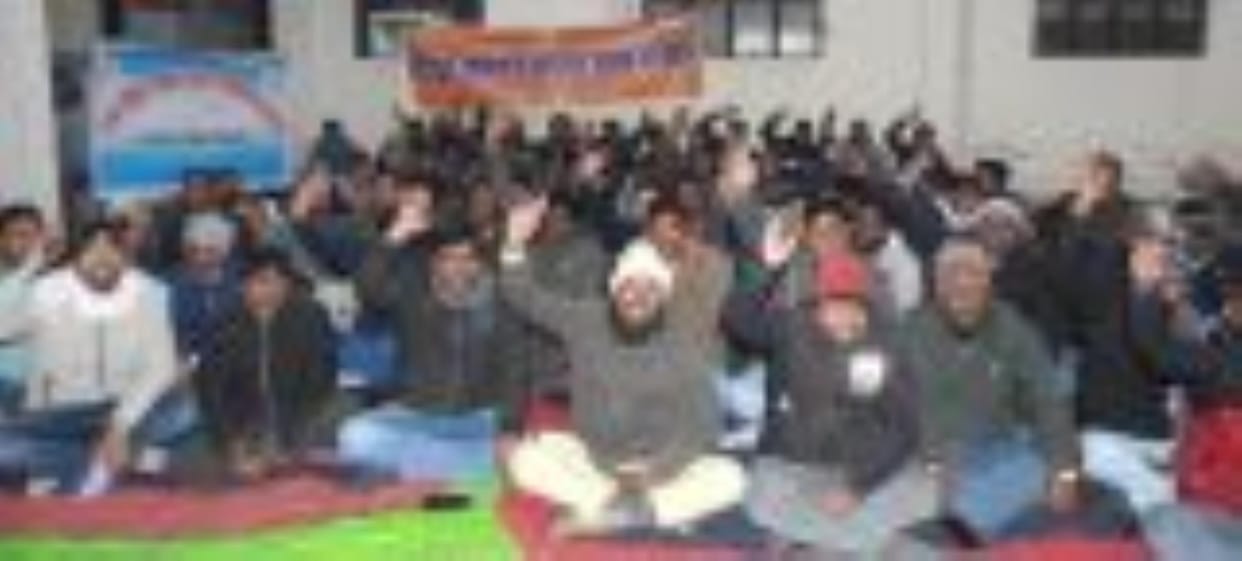 Protested against government policies, tied black band